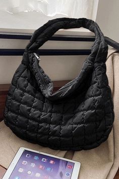 Elevate your look with the elegant quilted design of this shoulder bag. Think FP dupe Its spacious size, accommodates all your essentials with ease. The zipper closure ensures the secure storage of your belongings. Dimensions (inch): one : 15.75” (Length), 4.75 (Width), 12”(Height) * color may vary slightly due to image and screen lighting* **FREE SHIPPING** *ships approx. 3-4 bus days after purchase from CA Quilted Shoulder Bag, Quilted Handbags, Classic Bags, Large Shoulder Bags, Black Quilt, Zipper Top, Quilted Bag, Weekender Bag, Timeless Classic