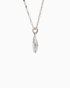 The Dewdrop Stone Pendant boasts a distinctively timeless design, featuring a pear-shaped white topaz stone cradled in sterling silver. Whether worn on its own for understated elegance or paired with a pair of Dewdrop Stone Earrings for a coordinated look, this pendant adds a touch of sophistication to any outfit. Pair with your favorite chain, sold separately. Metal: Sterling silver Stone: White topaz Dimensions: 20mm x 10mm Style #: P195W Timeless Teardrop Diamond Cut Jewelry, Modern Sterling Silver Pear-shaped Jewelry, Modern Pear-shaped Sterling Silver Jewelry, Modern White Gold Drop Jewelry, Teardrop Diamond Cut Diamond White Jewelry, Diamond Cut Diamond White Teardrop Jewelry, Classic Drop Jewelry With Polished Finish, Timeless Teardrop Diamond White Jewelry, Silver Diamond Briolette Jewelry