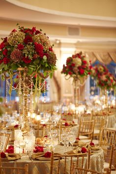 an image of a table set up with flowers and candles for a wedding or special event