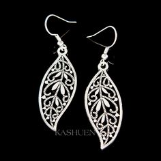 "You are getting 1 pair of Handcrafted dangling earrings made with antique silver pewter charm. The earrings measure around 11/16\" (1.7cm) wide X 1 3/4\" (4.3cm) high (not including the ear hooks). Prices are in US$. For shipping policies and other important information, click on \"profile\" on the right. See an item that you like but has already been sold? Contact me to see if I have more! Thank you for stopping by Kashuen Collectibles!" Boho Minimalist, Lucky Horseshoe, Earrings Christmas, 40th Birthday Gifts, Brooch Jewelry, Dangling Earrings, Jewelry For Her, 40th Birthday, Everyday Jewelry