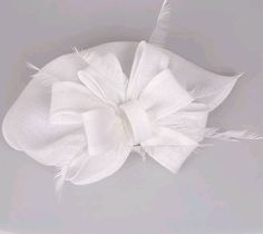 Elegant Blush sinamay Fascinator. Has clips for a secured and comfortable look. This will be a great way to add elegance to any, bridesmaid, rehearsal dinner, Wedding guest, cocktail party, or church - Rare find - Lightweight - Ready to ship - Fast Shipping - Free Shipping - Group discount available - Customize by adding different color flowers and or feathers - Headband and Hair clip It comes in other colors see their links below: PINK COLOR: https://www.etsy.com/HatsandPearls/listing/603380511 Elegant White Hat For Gift, Elegant White Costume Hat As Gift, White Mini Hats For Royal Ascot, White Fascinator For Kentucky Derby Gift, White Headpieces For Summer Gifts, White Summer Headpieces For Gifts, White Summer Headpieces As Gifts, White Summer Headpiece Gift, Elegant Wide Brim Hat For Gifts