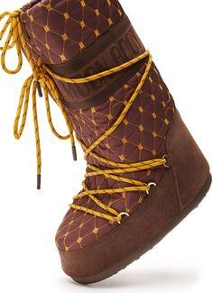 Step out in these fabulous snow boots and make a stylish statement while staying warm and dry. The diamond quilting and water-repellent calf suede ensure both fashion and function, and the mid-calf length and flat rubber sole provide the perfect combination of comfort and style. Chestnut brown and banana yellow colors Logo print to the side Round toe and front lace-up fastening Boots Moon, Quilted Boots, Banana Yellow, Moon Boot, High Leather Boots, Contour Kit, Moon Boots, Knee High Leather Boots, Chestnut Brown