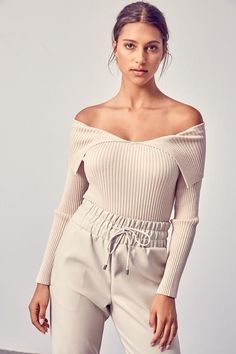 Sweater weather but make it chic. This piece features a thick ribbed material, off shoulder neckline with fold over detail, and snug fit. Pair with your favorite denim and tall booties to complete this fall look. "Open Shoulder Top" Ribbed Pullover off shoulder Rayon/Nylon Imported Hand wash Trendy Stretch Off-shoulder Top For Fall, Chic Fitted Off-shoulder Top For Fall, Fitted Chic Off-shoulder Top For Fall, Fitted Off-shoulder Top For Winter, Casual Off-shoulder Top For Winter, Casual Off-shoulder Stretch Top For Winter, Trendy Off-shoulder Top For Fall, Casual Stretch Off-shoulder Top For Winter, Chic Fitted Off-shoulder Top For Winter