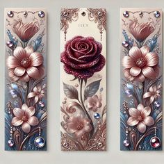 three decorative bookmarks with flowers and jewels on them, each decorated in different colors