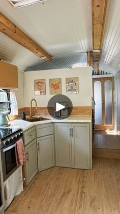 the kitchen is clean and ready to be used as a living room or dining area