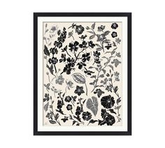 a framed black and white floral print