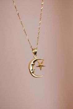 14k Solid Yellow Gold Moon And Star Pendant Charm | Luna Estrella Necklace | Astrology Jewelry Gift * Metal: 14K Yellow  Gold * Pendant Length: 16.9mm (0.6") * Pendant Width: 12.6mm (0.4'') * Pendant Avg Weight: 1.0g * Stamp: 14K * Chain Style & Length : 14k Yellow Gold 18"  Singapore (necklace set-option) * Complimentary Gift Box Guaranteed 14k real Gold NOT gold plated or filled. Image may be enlarged to show details. Please read description.  Return Policy  I gladly accept returns and exchanges Contact me within: 3 days of delivery Ship items back within: 7 days of delivery I don't accept cancellations But please contact me if you have any problems with your order. The following items can't be returned or exchanged Because of the nature of these items, unless they arrive damaged or defe Celestial Star-shaped 14k Gold Jewelry, Celestial Yellow Gold Jewelry With Star Charm, Elegant Star-shaped Sun And Moon Necklace, 14k Gold Star-shaped Moon Charm Jewelry, Celestial 14k Gold Necklace With Star Charm, Celestial Gold Plated Jewelry With Star Charm, Gold Star Jewelry With Moon Phase Detail, Gold Star-shaped Jewelry With Moon Phase Detail, 14k Gold Celestial Jewelry Featuring Moon Phases