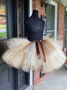 "This listing includes an elegant mix of  brown, beige ivory and old gold tutu with a brown satin bow for waist sizes up to 34 1/2\" can be made larger if interested contact me for a special listing. Other colors also available see color chart for available tulle colors. Just make a note in the note to seller section when checking out if you would like a different color.   First five pictures show the tutu in the 13-18\" length range with a longest layer of 18\" and top layer of 13\".  The sixth Maternity Tutu, Bachelorette Tutu, Adult Cake Smash, Gold Tutu, Brown Ribbon, Black Tutu, Princess Tutu, Glitter Ribbon, Brown Satin