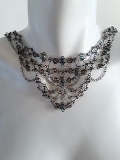 Evening Dress Jewelry, Elegant Metal Rhinestone Necklace, Silver Crystal Costume Necklace, Elegant Iridescent Crystal Necklace, Gothic Art Deco, Glamorous Beaded Metal Rhinestone Necklace, Crystal Backdrop, Silver Crystal Necklaces With Sparkling Stones, Costume Jewelry, Gunmetal Blue