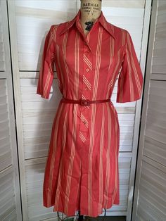 Vintage 60s/70s Serbin Of Florida Shirt Dress Plaid Cotton Drop Waist Pleated Med Short sleeves. Light weight orange yellow striped cotton fabric. Buttons down 1/2 the front. Collared. Drop waist with pleated skirt portion. Orange matching belt. Measurements laying flat Pit to pit 18" Waist 16" Length 38" Sleeves shoulder to wrist 21.5" Very clean. Little signs of any wear other than the belt which has dent or two. Florida Vintage, Florida Shirt, Jaune Orange, Vintage Florida, Yellow Stripes, Plaid Dress, Vintage 60s, Drop Waist, Dress Clothes For Women