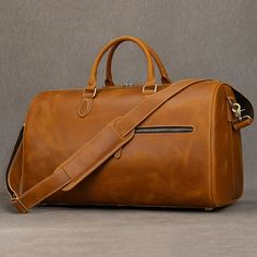 If you’re looking for a travel bag that seamlessly blends classic elegance with versatility, this vintage-style duffel bag is the perfect choice. Crafted from genuine leather, it offers a spacious interior and multiple carrying options—by hand, on your shoulder, or as a crossbody. The secure zipper closure keeps your belongings safe while ensuring easy access. This duffel bag is perfect for any journey. Mens Duffle Bag, Travel Duffle Bag, Mens Travel, Mens Travel Bag, Leather Travel Bag, Travel Duffle, Duffle Bag Travel, Mens Leather Bag, Crazy Horse