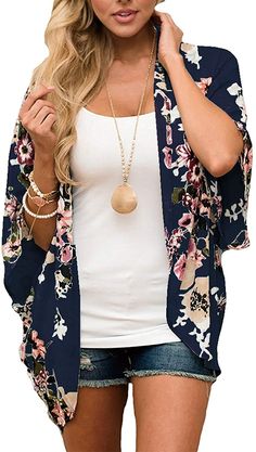 Kimonos are the perfect summer layering piece. Wear over a favorite tank as a cardigan or take to the beach as a swimsuit cove rup. It's an incredibly versatile piece in your wardrobe. It comes in bright floral patterns as well as leopard.. Lightweight, airy material Great for layering Bright spring/summer patterns Casual V-neck Cardigan For Vacation, Lightweight Open Front Casual Cover-up, Spring Summer V-neck Cardigan, Casual Lightweight Fall Cover-up, Lightweight Casual Fall Cover-up, Blue Open Front Cover-up For Vacation, Lightweight Casual Cover-up, Trendy Long Sleeve Summer Cover-up, Lightweight Casual Cardigan