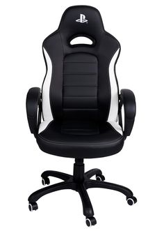 a black and white gaming chair sitting on top of a desk