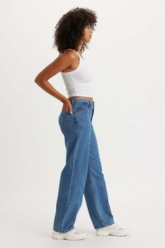 The kind of jean you might steal from your dad's closet but baggier. With a mid rise and straight leg, this pair is relaxed yet flattering with extra room for a subtle edge. Throw on your favorite kicks for that chill ‘90s look any day of the week. A fit inspired by the way our dads rock their jeans—but baggier Featured in a mid rise with a straight leg Roomy and slouchy through the hip and thigh Designed to stack at the hem How it Fits Loose Through The Hip And Thigh Mid rise Straight Leg Front Everyday Denim Blue Flare Jeans, Medium Wash Bottoms With Standard Cut Leg For Everyday, Everyday Medium Wash Full-length Flare Jeans, Everyday Medium Wash Full Length Flare Jeans, Classic Rigid Denim Flare Jeans For Everyday, Classic Flare Jeans In Rigid Denim For Everyday, Straight Medium Wash Bottoms For Everyday, Everyday Rigid Denim Jeans With Standard Cut Leg, Everyday Use Straight Leg Bottoms With Five Pockets