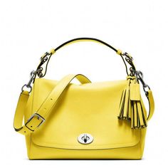 $398 NWT Coach Coach Legacy Leather Romy Top Handle Handbag Sliver/Lemon            Style: Coach Coach Legacy Leather Romy Top Handle Handbag    Condition: Brand New with Tag    Color: Sliver/Lemon    Handbag Description: Smooth glove-tanned leather adds refined luxury to this midsize flap silhouette. Finished by hand with a convertible crossbody strap, raw-edge leather tassels and a classic turnlock closure, it contains pockets to Handbag Street Style, Winter Spring Outfits, Chanel Bag Outfit, Cheap Coach Bags, Coach Hobo Bag, Silk Purse, Accessorize Bags, Coach Legacy, Coach 1941