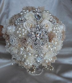 a bridal bouquet with pearls and flowers