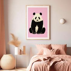 a panda bear sitting on top of a bed next to a pink wall in a bedroom