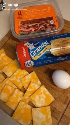 ingredients to make ham and cheese sandwich displayed on cutting board