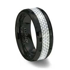 a black and white wedding ring with two rows of carbon fiber inlays on it