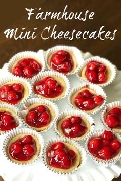 mini cheesecakes with cherries are arranged on a white plate and the words, farmhouseise mini cheesecakes