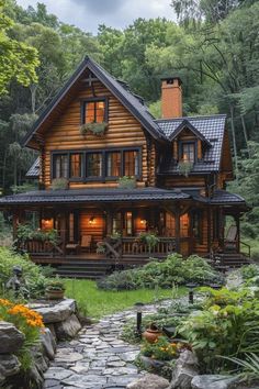 a log cabin with stone walkway leading to the front door