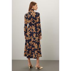 Multicolor floral (55% Rayon, 30% Polyester, 5% Elastane). A-line. Long sleeves. Turtleneck. Back zipper closure. 49.5" from shoulder to hemline. Imported. Fall A-line Maxi Dress For Brunch, Chic Knee-length Floral Dress For Fall, Fitted Floral Print Dress For Fall, Elegant Floral Dress For Fall Garden Party, Fall Floral Midi Dress For Garden Party, Fall Garden Party Floral Midi Dress, Floral Print Midi Dress For Work, Elegant Floral Print Fit And Flare Midi Dress, Chic Floral Dress For Fall