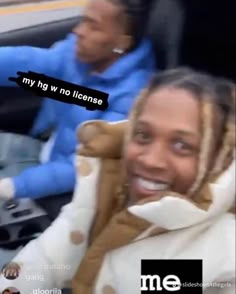 a woman sitting in the back seat of a car with another person behind her smiling