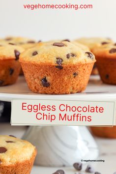 eggless chocolate chip muffins on a white cake plate with text overlay