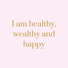 the words i am healthy, wealhy and happy in gold on a pink background