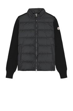 Find MONCLER Cardigan on Editorialist. Moncler Cardigan in Black Self 1: 100% polyester Self 2: 100% virgin wool Front Lining and Padding: 100% polyester. Made in Turkey. Dry clean. Dual front zipper closure. Side zippered pockets. Attached hood with stowaway zippered compartment. Padded nylon fabric with knit sleeves and trim. MONC-MK55. J20919B00032M1131. About the designer: Established in 1952, Monclers quintessential quilted Jacket has remained the choice of the worlds most demanding athlete Moncler Jacket, Knit Sleeve, Side Zipper, Quilted Jacket, Black Cardigan, Jet Set, Front Zipper, Zipper Pocket, Knitted Sweaters