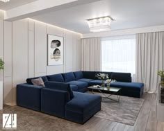 a living room with blue couches and white curtains on the windowsills, along with a coffee table