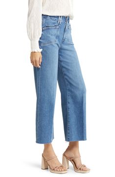 The faded wash and roughed-up edges of these wide-leg jeans offer an authentic rigid look, but the denim is surprisingly soft and stretchy with great recovery. 26" inseam; 22" leg opening; 11 1/4" front rise; 15 1/2" back rise (size 29) 93% cotton, 5% polyester, 2% spandex Machine wash, line dry Imported Medium Wash Wide Leg Cropped Jeans, Wide Leg Cropped Jeans In Medium Wash, Chic Wide Leg Faded Jeans, Faded Washed Cropped Flare Jeans, Faded Wide Leg Jeans With Frayed Hem, Medium Wash Wide Leg Cropped Jeans With Frayed Hem, Distressed Wide Leg Cropped Jeans In Dark Wash, Faded Flare Jeans With Frayed Hem In Rigid Denim, Denim Blue Washed Flare Jeans