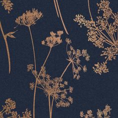 a blue and gold wallpaper with some flowers on the left side, in front of a dark background