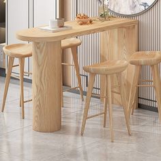 three stools and a table in a room with a clock on the wall behind it