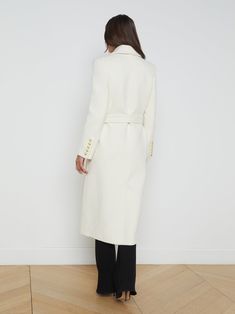 Classic meets chic in our Olina belted long coat, perfectly crafted from a premium wool sustainably produced by Manteco in Tuscany, Italy.• Manteco wool-blend fabric• Fully lined• Double-breasted front closure with tie belt• Flap pockets• Embossed dome buttons• Back hem vent | L'AGENCE Olina Coat In Ivory Belt Tying, Wool Blend Coat, Tuscany Italy, Fall Shopping, Tie Belt, Long Coat, Shoe Sale, Tuscany, Double Breasted