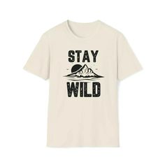 Get ready to unleash your wild side with our ultra-trendy Stay Wild Shirt! This unisex soft-style Stay Wild Merch is a must-have for those who want to showcase their untamed spirit in a comfortable and stylish manner. Made from ultra-soft materials for maximum comfort Available in a vibrant yellow hue to embrace your adventurous spirit Crafted with twill tape on the shoulders and ribbed knitting on the collar for enhanced strength and durability Relaxed fit for everyday wear, or size up for an o Casual Tops With Front Print For Outdoor Activities, Casual Graphic Print Tops For Outdoor Activities, Outdoor Slogan Tops With Crew Neck, Trendy Graphic Print Tops For Outdoor Activities, Casual Outdoor Tops With Front Print, Cotton Slogan Tops For Outdoor Activities, Relaxed Fit Tops With Logo Print For Outdoor Activities, Casual White Tops For Adventure, Outdoor Slogan Crew Neck Top