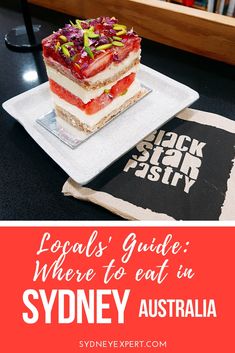 there is a piece of cake on the table with text that reads locals'guide where to eat in sydney australia