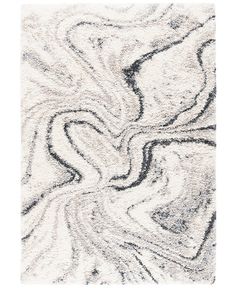 a white rug with black and grey swirls on the top, in front of a white background