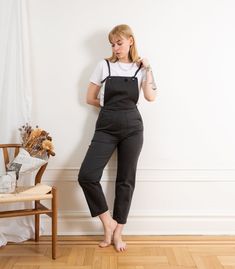 The Knot Overalls are our latest version of our flattering overalls collection! Made from stretch washed Black twill and featuring a waistband at the natural waist, front and back pockets, side zipper and adjustable knotted straps. FIT NOTE: The measurements below are of the actual pants. These are made with stretch fabric and will fit up to 2" bigger if needed as they will stretch to fit your body. If you want a tight snug fit, we suggest buying these in the smallest size that will fit as they Utility Cotton Overalls With Belt Loops, Casual Workwear Overalls With Belt Loops, Cotton Overalls With Belt Loops For Work, Casual Cotton Jumpsuits And Rompers With Belt Loops, Washed Black Denim Jumpsuit With Pockets, Washed Black Cotton Denim Jumpsuit With Pockets, Utility Overalls With Belt Loops, Utility Style Overalls With Belt Loops, Casual Cotton Overalls With Belt Loops