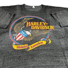 Vintage Crazy Faded Harley Davidson Eagle Graphic Black T Shirt. Crazy Wear On This Tee. Super Soft And Well Worn In. Tough To Find Size. Fits A 2-3x. Measures 26x32. Sleeves Have A Weird Cut The Sleeve Opening Is 6.5 Inches. Please Check Measurements Before Purchasing. I Do My Best To Show Any Flaws In Pictures. Quick Shipping! Bundles Encouraged! @Ants_haul On Instagram. Harley Davidson Tshirt Design, Harley Davidson Skull Shirt, Harley Davidson Button Up Shirts, Harley Davidson Vintage Tee, Harley Davidson Tee, Harley Davidson Shirt, American Vintage, Black Tshirt, Graphic Shirts