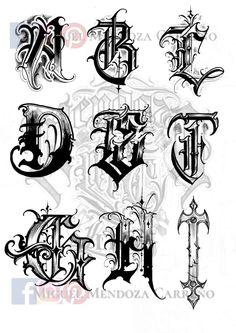 some type of gothic alphabets with different letters and numbers on them, all in black ink