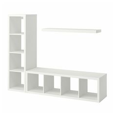 a white shelf with two shelves on one side and an empty shelf on the other