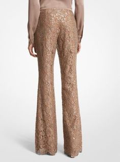 Intricately crafted from floral lace with a suntan-hued lining, these trousers are an ultra-romantic upgrade from basic flares. Featuring elaborate sequin hand-embroidery, they’re designed with a concealed side-zip fastening and scalloped hems. Wear yours with a tonal pullover or a shoulder-baring blouse. Lace Flare Pants For Party, Chic Embellished Bottoms For Wedding, Elegant Flared Bottoms For Wedding, Chic Embellished Wedding Bottoms, Lace Flare Bottoms For Party, Flare Lace Bottoms For Party, Elegant Fitted Pants For Festive Occasions, Luxury Fitted Wedding Bottoms, Fitted Sequin Luxury Pants