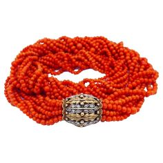 Elegant Multi-strand Red Coral Jewelry, Elegant Orange Red Coral Beads, Elegant Red Coral Jewelry With Faceted Beads, Elegant Single Strand Coral Beads, Elegant Orange Bracelets With Faceted Beads, Elegant Coral Beads, Elegant Orange Beaded Necklaces With Spacer Beads, Elegant Orange Beaded Necklace With Spacer Beads, Elegant Orange Necklace With Spacer Beads