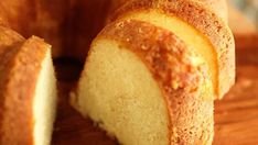 a bundt cake is cut in half on a cutting board