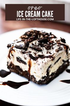 a piece of ice cream cake sitting on top of a white plate