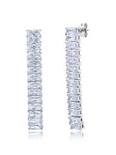 Made of flashy baguettes, these earrings will be sure to make a statement! In a shimmering Platinum finish or classic 18kt YG, these earrings are sure to turn heads. Who said diamonds had to be boring? Let your ears rock a fun, fashionable look!-18kt Yellow Gold Finish over .925 Sterling Silver OR -Sterling Silver .925 in Platinum Finish -Sku:SKU: 3012632E00CZ/ SKU: 9012632E00CZ -Lifetime Warranty -6.4 carat total weight -100% Hypo-Allergenic -Non-Conflict $265.00 Formal Baguette Cubic Zirconia Earrings, Luxury Baguette Earrings For Formal Occasions, Modern Baguette Earrings For Formal Events, Modern Baguette Earrings For Formal Occasions, Evening Baguette Diamond Drop Earrings, Luxury White Sterling Silver Linear Earrings, Nickel-free Yellow Gold Linear Earrings In Sterling Silver, 14k Gold-filled White Linear Long Drop Earrings, Luxury Gold-plated Statement Linear Earrings