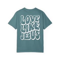 Comfort Colors Love Like Jesus Shirt Embrace faith-inspired comfort and style with our Comfort Colors Love Like Jesus Shirt. This shirt beautifully combines a simple design with unmatched comfort, allowing you to wear your faith proudly while enjoying a soft, relaxed fit. Key Features: Premium Comfort Colors Fabric: Crafted from the renowned Comfort Colors fabric, this shirt offers superior softness, durability, and a vintage, lived-in feel that ensures comfort with every wear. Inspirational Design: Adorned with the heartfelt and powerful message, this shirt serves as a daily reminder of Jesus' love, grace, and redemption, making it a meaningful addition to your wardrobe. Versatile and Stylish: Whether you're attending a Bible study, church event, or simply seeking a stylish and faith-fill Inspirational Crew Neck T-shirt With Lettering, Inspirational Short Sleeve Shirt With Graphic Print, Inspirational Short Sleeve Graphic Print Shirt, Inspirational Lettering Crew Neck T-shirt, Inspirational Graphic Print Short Sleeve Shirt, Inspirational Relaxed Fit Tops For Streetwear, Relaxed Graphic Tee With Lettering, Graphic Tee With Lettering In Relaxed Fit, Relaxed Fit Graphic Tee With Lettering