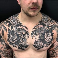 a man with tattoos on his chest and chest is looking at the camera while wearing a crown