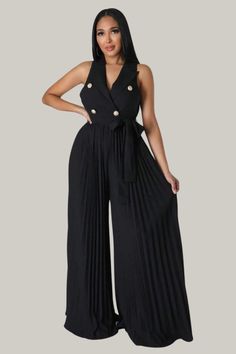 Incorporate sophistication and exclusivity into your wardrobe with this luxurious Button Front Pleated Hem Belted Pleated Wide Leg Jumpsuit. Boasting a lapel neckline and a high waistline, this garment offers a tasteful and elegant fit, while the double button and pleated details elevate its style. The slight stretch fabric provides comfort and versatility, making it the perfect addition to your premium collection. 95% Polyester, 5% Elastane Model is wearing size small Please allow 3-5 business Elegant Pleated Jumpsuits And Rompers For Summer, Fitted V-neck Jumpsuits And Rompers With Buttons, Elegant Sleeveless Pleated Jumpsuits And Rompers, Elegant Sleeveless Pleated Jumpsuit And Romper, Chic V-neck Jumpsuits And Rompers With Button Closure, Chic Sleeveless Pleated Jumpsuits And Rompers, Chic V-neck Jumpsuits And Rompers With Buttons, Chic High Waist Jumpsuits And Rompers, Chic Pleated Jumpsuits And Rompers For Evening